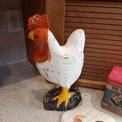 WOODEN ROOSTER, CERAMIC CUTTING BOARD AND A TIN