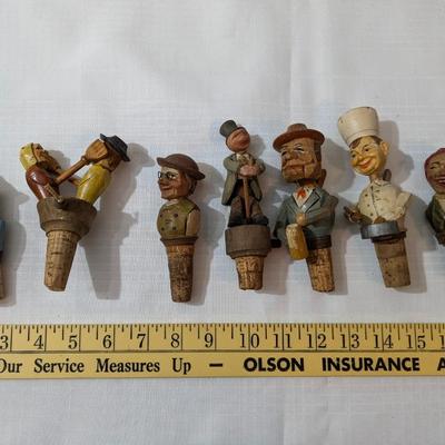 Lot of 7 Hand Carved Mechanical Wine Stoppers