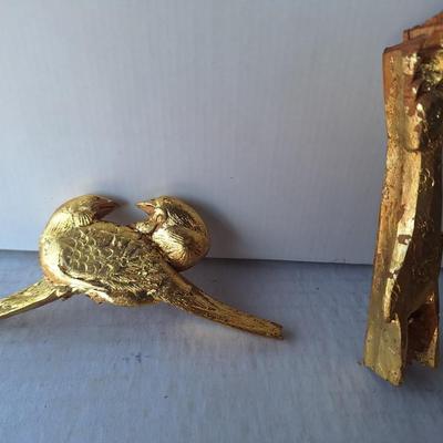 2 golden Wooden animals