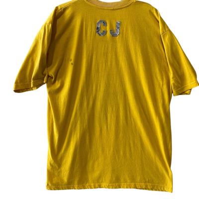 Rudy wear gold T-shirt