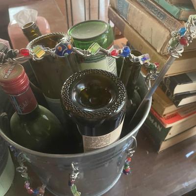 Empty wine bottles and cool bucket