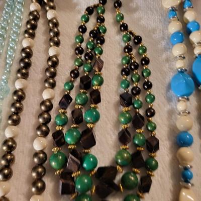 4 BEADED NECKLACES