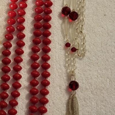 COLORFUL NECKLACES AND A LOCKET
