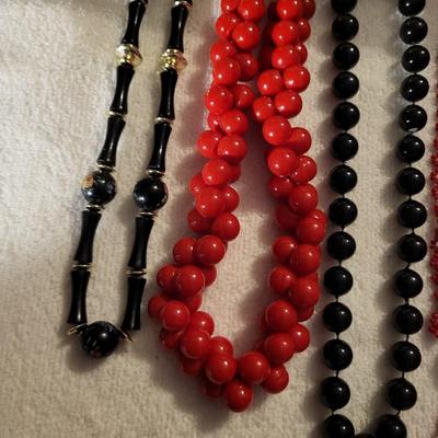 BLACK AND RED BEADED NECKLACES