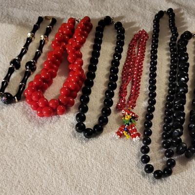 BLACK AND RED BEADED NECKLACES