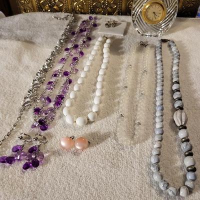 A VARIETY OF COSTUME JEWELRY AND A SASAKI QUARTZ GLASS CLOCK