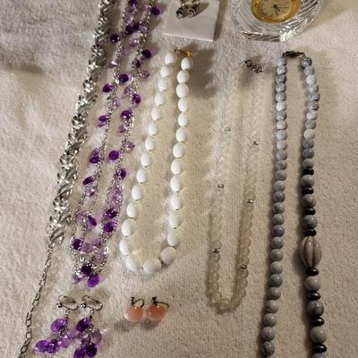 A VARIETY OF COSTUME JEWELRY AND A SASAKI QUARTZ GLASS CLOCK