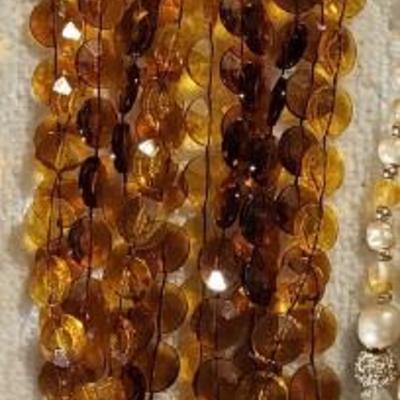 MULTI STRAND NECKLACES