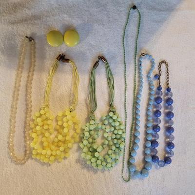 NICE PASTEL COSTUME JEWELRY SLOW DOWN