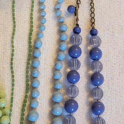 NICE PASTEL COSTUME JEWELRY SLOW DOWN