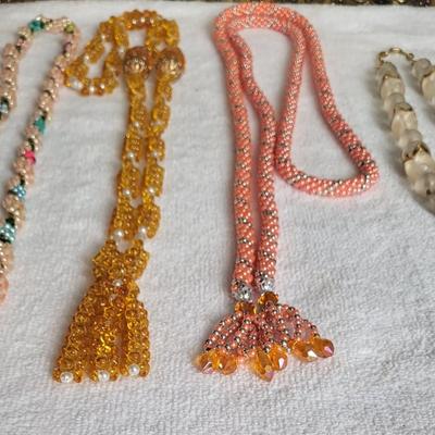 4 COSTUME NECKLACES