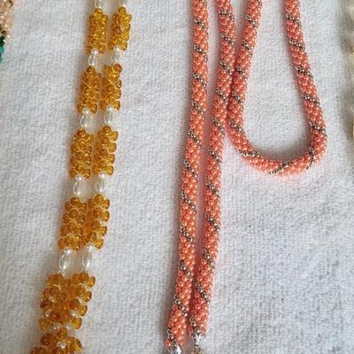 4 COSTUME NECKLACES