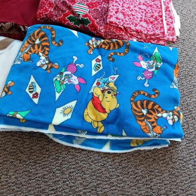HANDMADE THROW BLANKET AND PIECES OF FLEECE MATERIAL