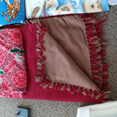 HANDMADE THROW BLANKET AND PIECES OF FLEECE MATERIAL