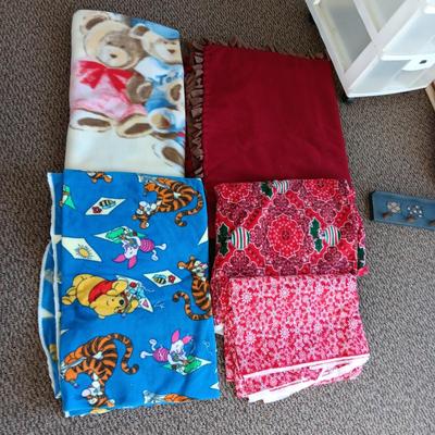 HANDMADE THROW BLANKET AND PIECES OF FLEECE MATERIAL