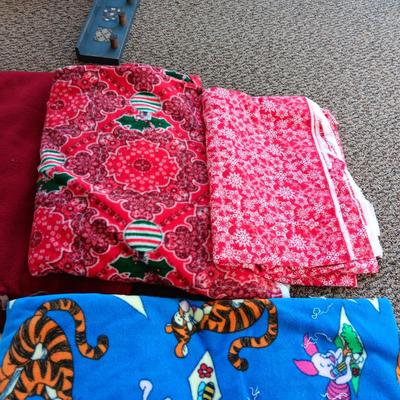 HANDMADE THROW BLANKET AND PIECES OF FLEECE MATERIAL