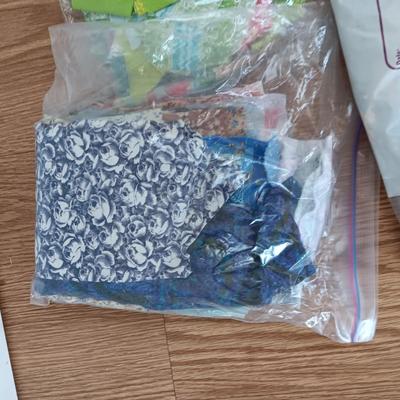 SCRAPS OF SEWING MATERIAL