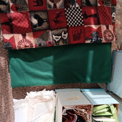 SCRAPS OF SEWING MATERIAL, LARGER PIECES OF FLEECE AND PATTERN BOXES