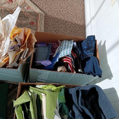 SCRAPS OF SEWING MATERIAL, LARGER PIECES OF FLEECE AND PATTERN BOXES