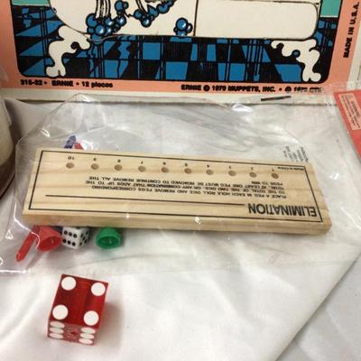 Sale Photo Thumbnail #123: You get complete set poker chips, wood game Ernie letter E puzzle, dice and Burlington Northern RR golf ball.