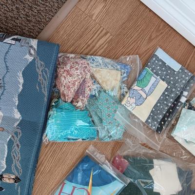 SCRAPS OF SEWING MATERIAL AND TABLE RUNNERS