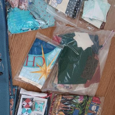 SCRAPS OF SEWING MATERIAL AND TABLE RUNNERS