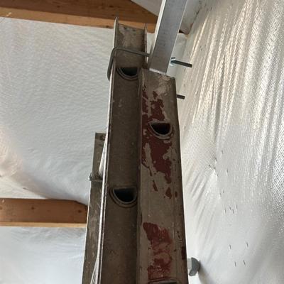 VERY TALL ALUMINUM EXTENSION LADDER WITH WALL SUPPORT