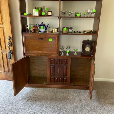 Sale Photo Thumbnail #5: This beautiful piece has a pullout display section perfect for an in-home bar. Also offers plenty of storage. 6ft x 58w x 16d.