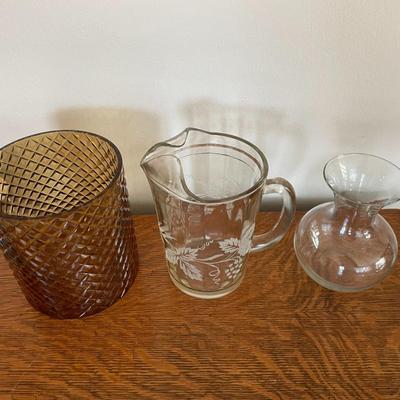 Sale Photo Thumbnail #71: Golden Color Candle Holder, Pitcher with Gold Trim and Clear Glass Flower Vase.