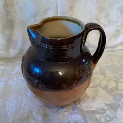 Antique Royal Doulton salt glazed embossed pitcher