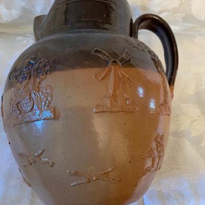 Antique Royal Doulton salt glazed embossed pitcher