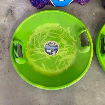 SNOW SLEDS AND HELMETS