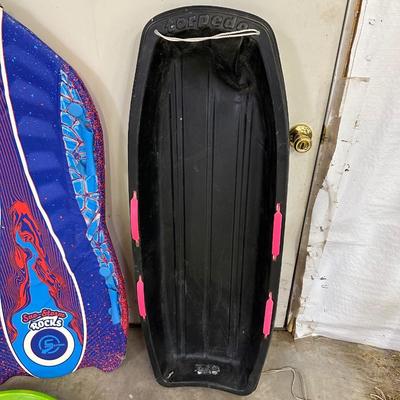 SNOW SLEDS AND HELMETS