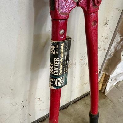 BOLT CUTTERS AND A SPUD BAR