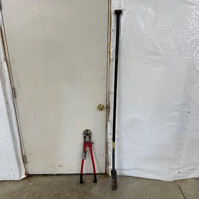 BOLT CUTTERS AND A SPUD BAR