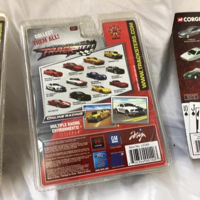 Sale Photo Thumbnail #174: You get two Trackster cars one Dodge Charger the other is GT 500.  The Casino Royal car is Aston Martin.  All are new in packaging.