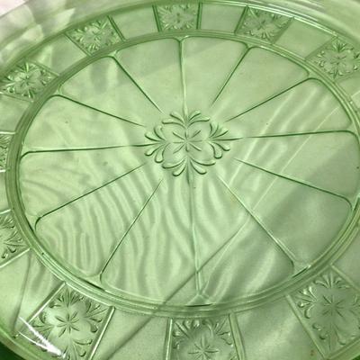 Sale Photo Thumbnail #196: This is a great uranium green glass cake plate.  It does glow under black light.