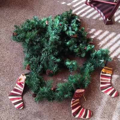 LIGHTED GARLAND WITH PINECONES AND STOCKINGS