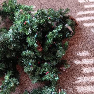 LIGHTED GARLAND WITH PINECONES AND STOCKINGS