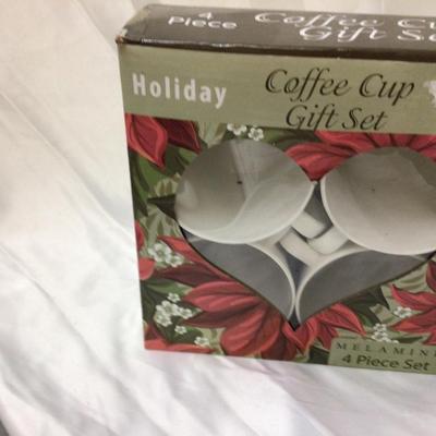 Sale Photo Thumbnail #225: You get set of four pointsettia coffee cups new in box, and tree Xmas themed bowls.  Candy cane, red with polka dots, and penguin with candy cane scoop.