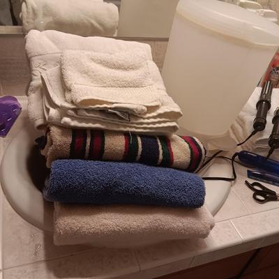 TOWELS, TOILETRIES, CLEANERS AND CURLING IRONS