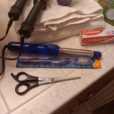 TOWELS, TOILETRIES, CLEANERS AND CURLING IRONS