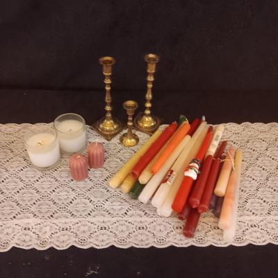 BRASS CANDLESTICKS AND TAPERED CANDLES