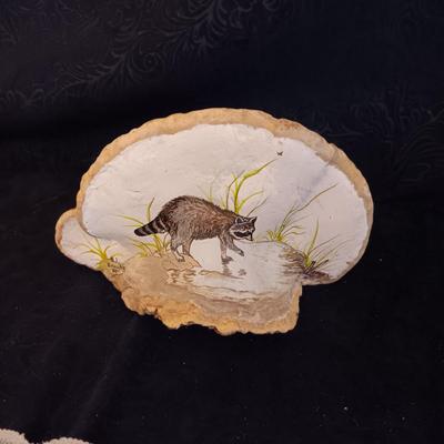 POSSUM PELT AND A RACOON PAINTED ON A PIECE OF MONKEY POD