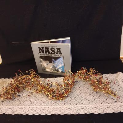 NASA ANNIVERSARY EDITION COFFEE TABLE BOOK AND RED, WHITE AND BLUE GARLAND