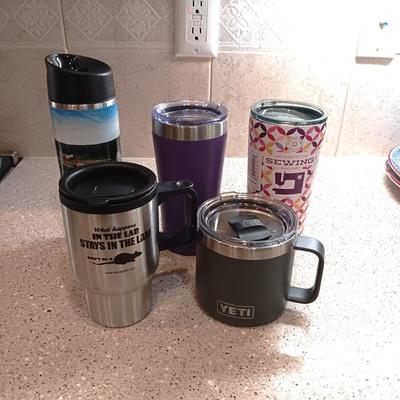 YETI COFFEE MUG AND SEVERAL TRAVEL CUPS