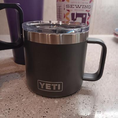 YETI COFFEE MUG AND SEVERAL TRAVEL CUPS