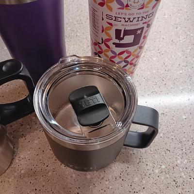 YETI COFFEE MUG AND SEVERAL TRAVEL CUPS
