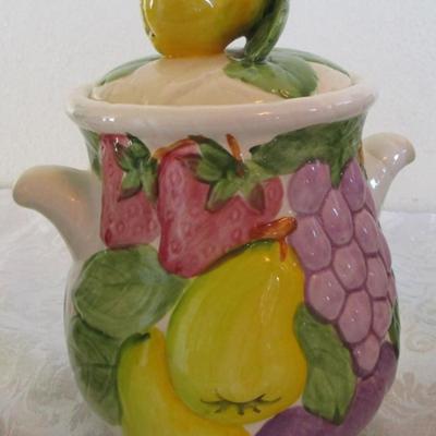 8-piece vintage ceramic cannister set (4 canisters plus lids)