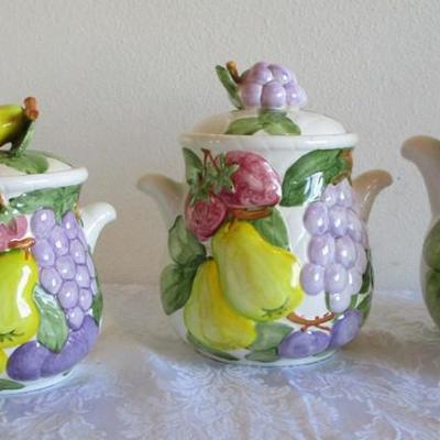 8-piece vintage ceramic cannister set (4 canisters plus lids)
